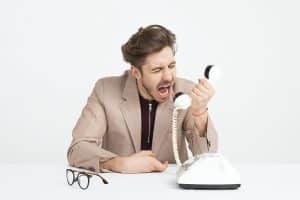 Man yelling on a phone